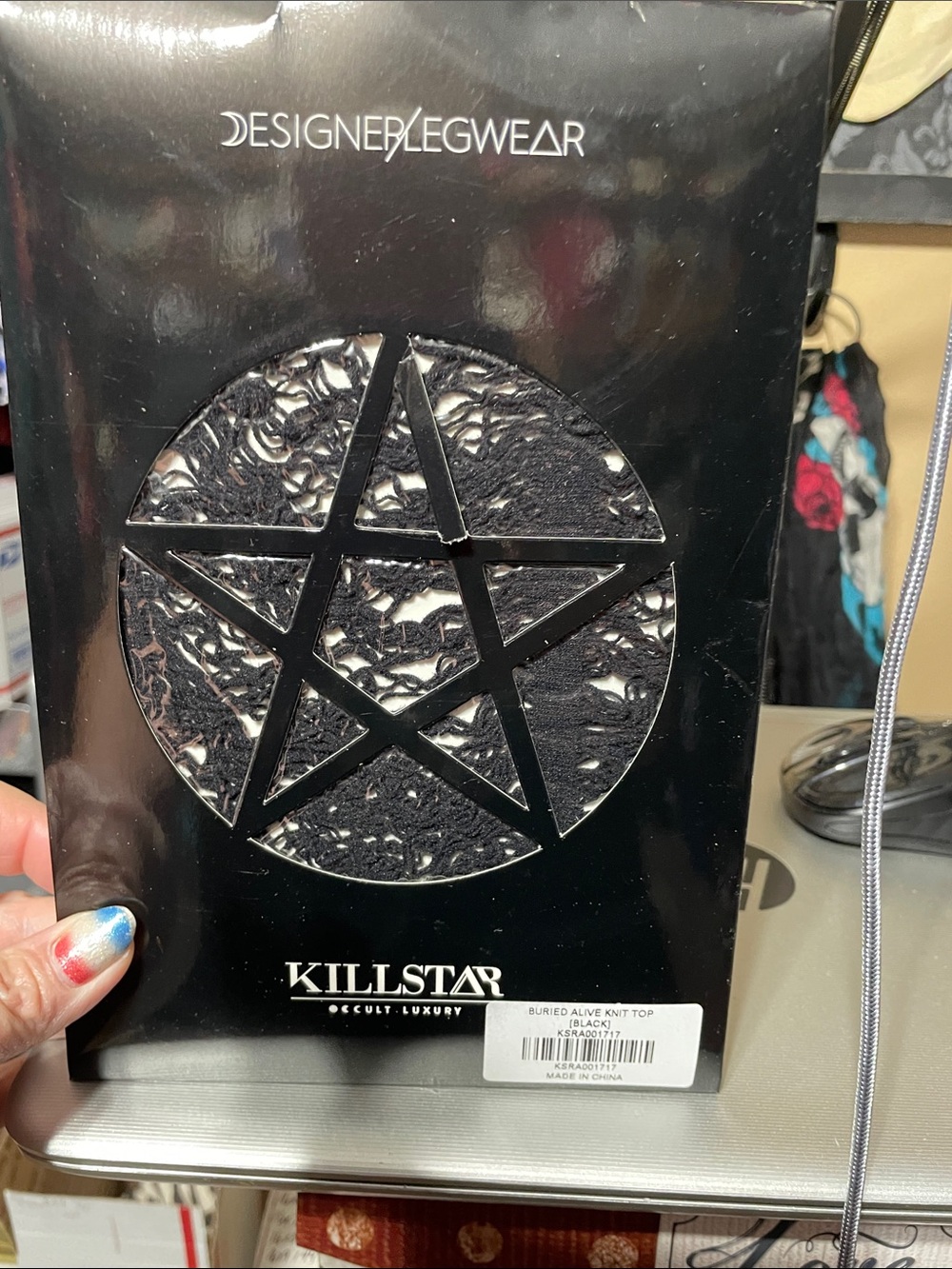 One size fits most. (At least up to a 3x) Killstar “buried alive Knit Top”